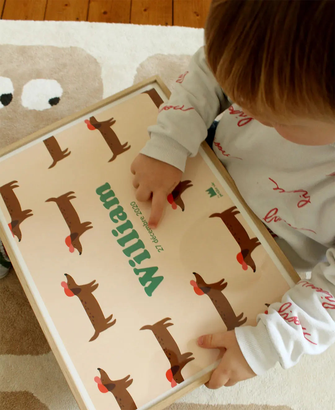 Affiche avec des teckels et le prénom de bébé pour décorer sa chambre